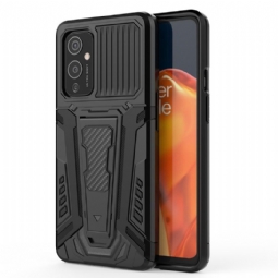 Kuori OnePlus 9 Heavy Duty Jalustalla