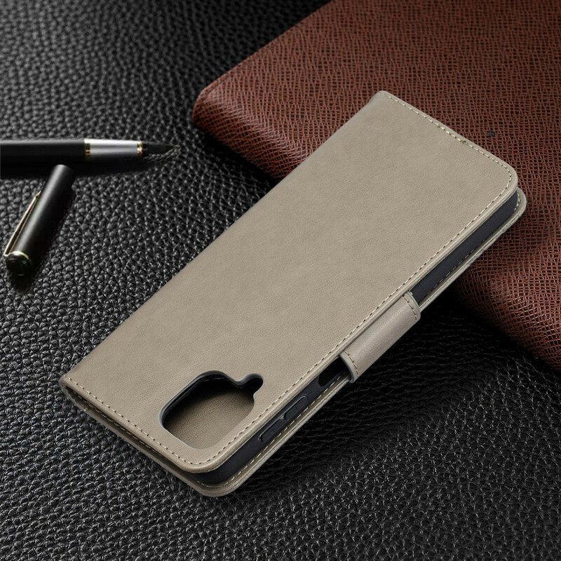 Flip Case Samsung Galaxy M12 / A12 Perhosia Lennossa Lanyardin Kanssa