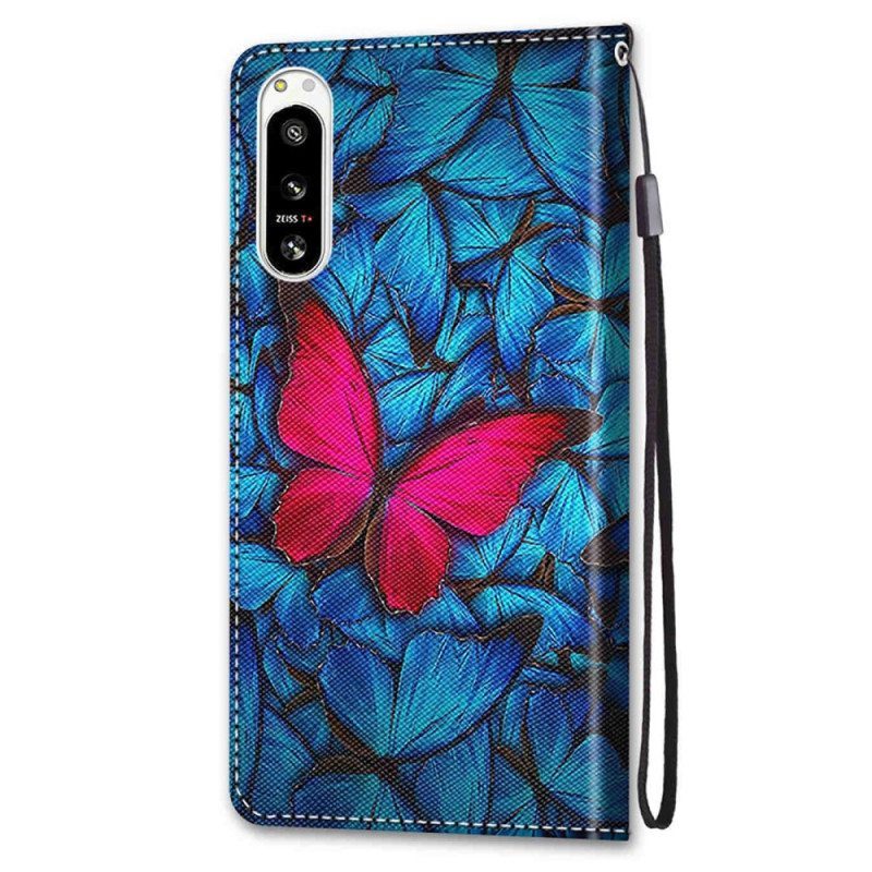 Flip Case Sony Xperia 5 IV Punainen Perhonen Sininen Tausta